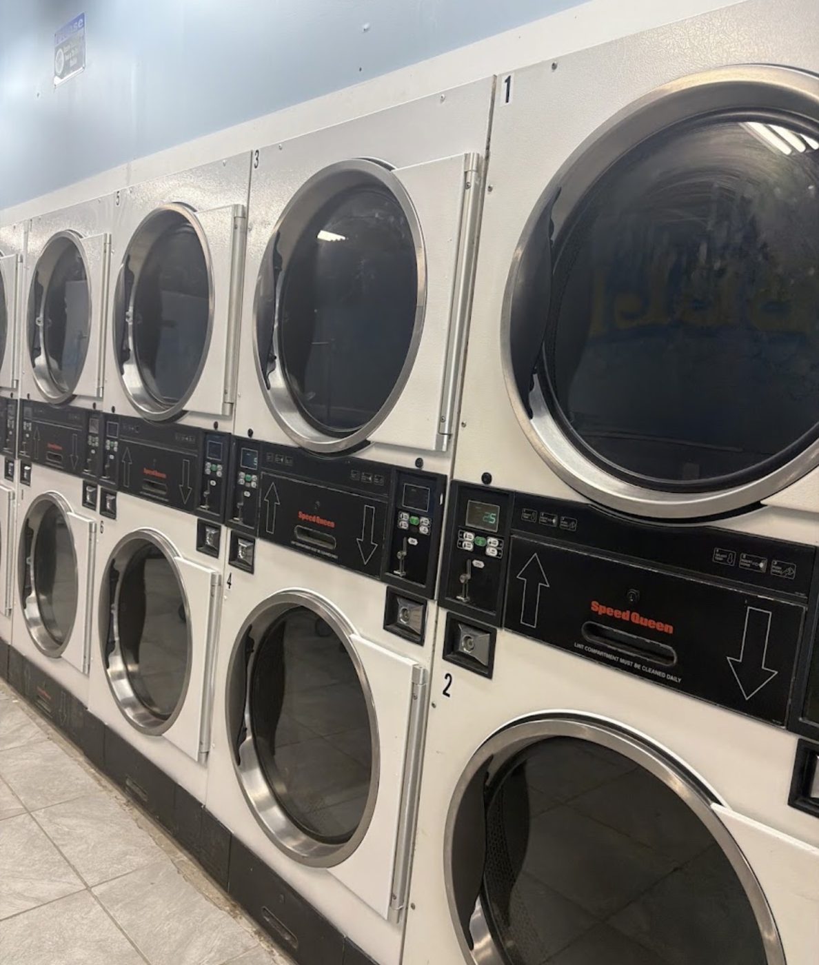 Row of stacked dryers